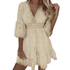 Mini dress made from hollowed-out lace