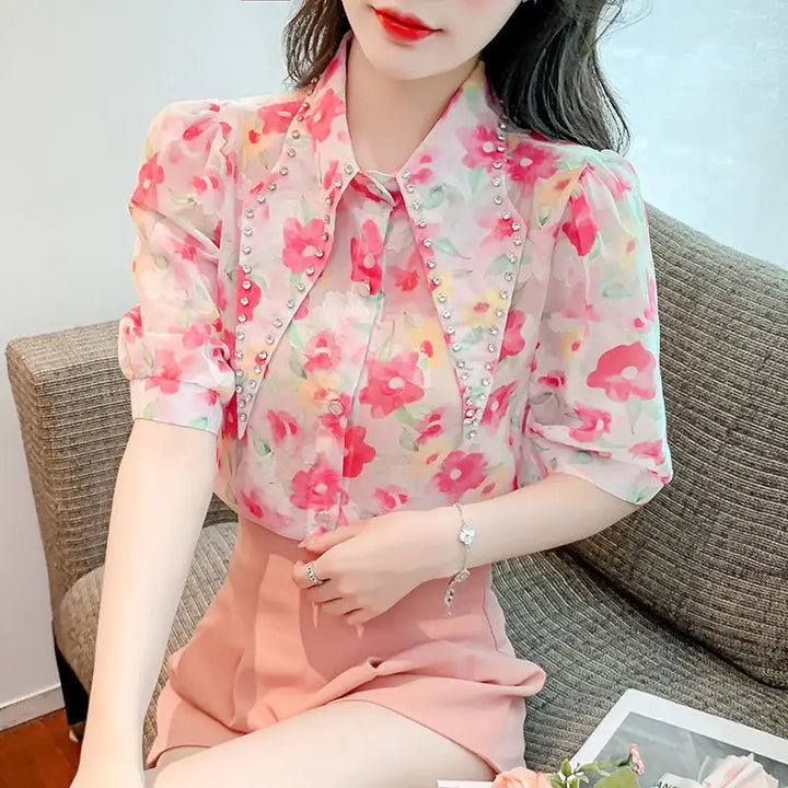 Chiffon blouse with puff sleeves and diamond collar