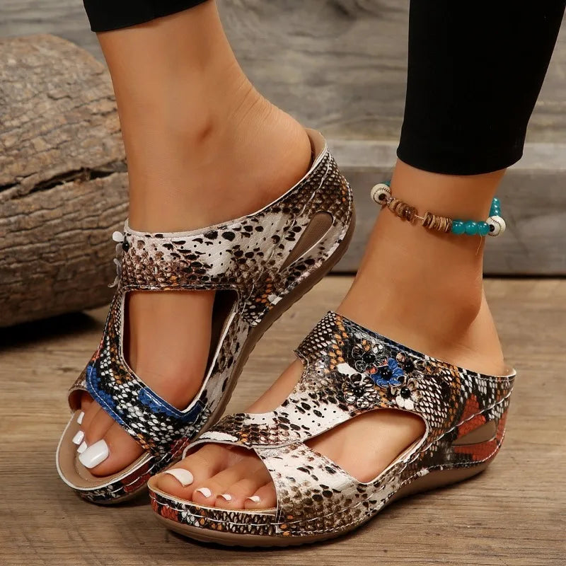 Summery wedge heel sandals with a retro floral pattern