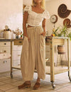 Wide-leg trousers in cotton and linen with elasticated waistband and pockets