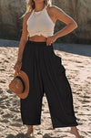 Wide-leg trousers in cotton and linen with elasticated waistband and pockets