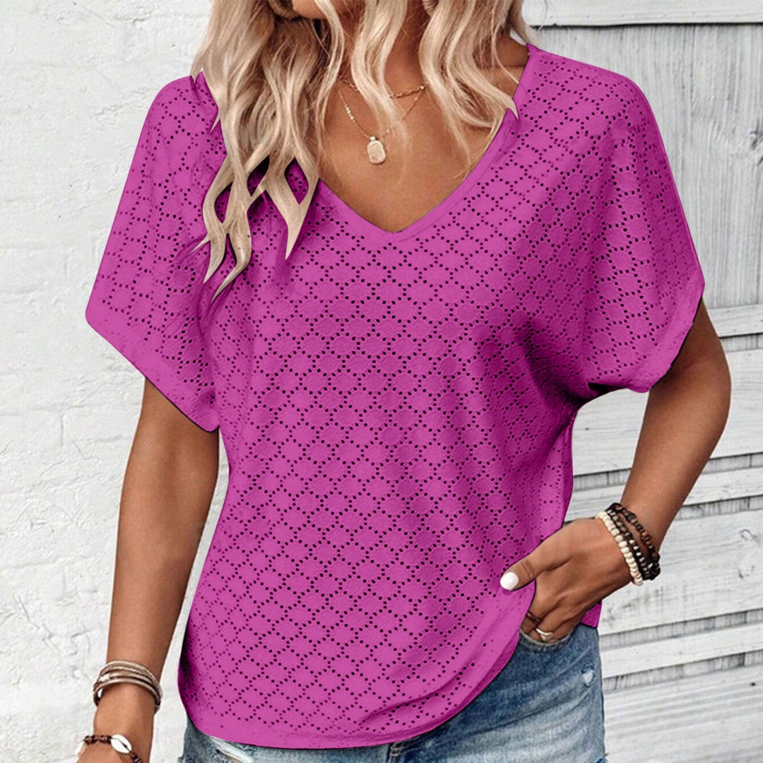 T-shirt with eyelet button embellishment and V-neckline