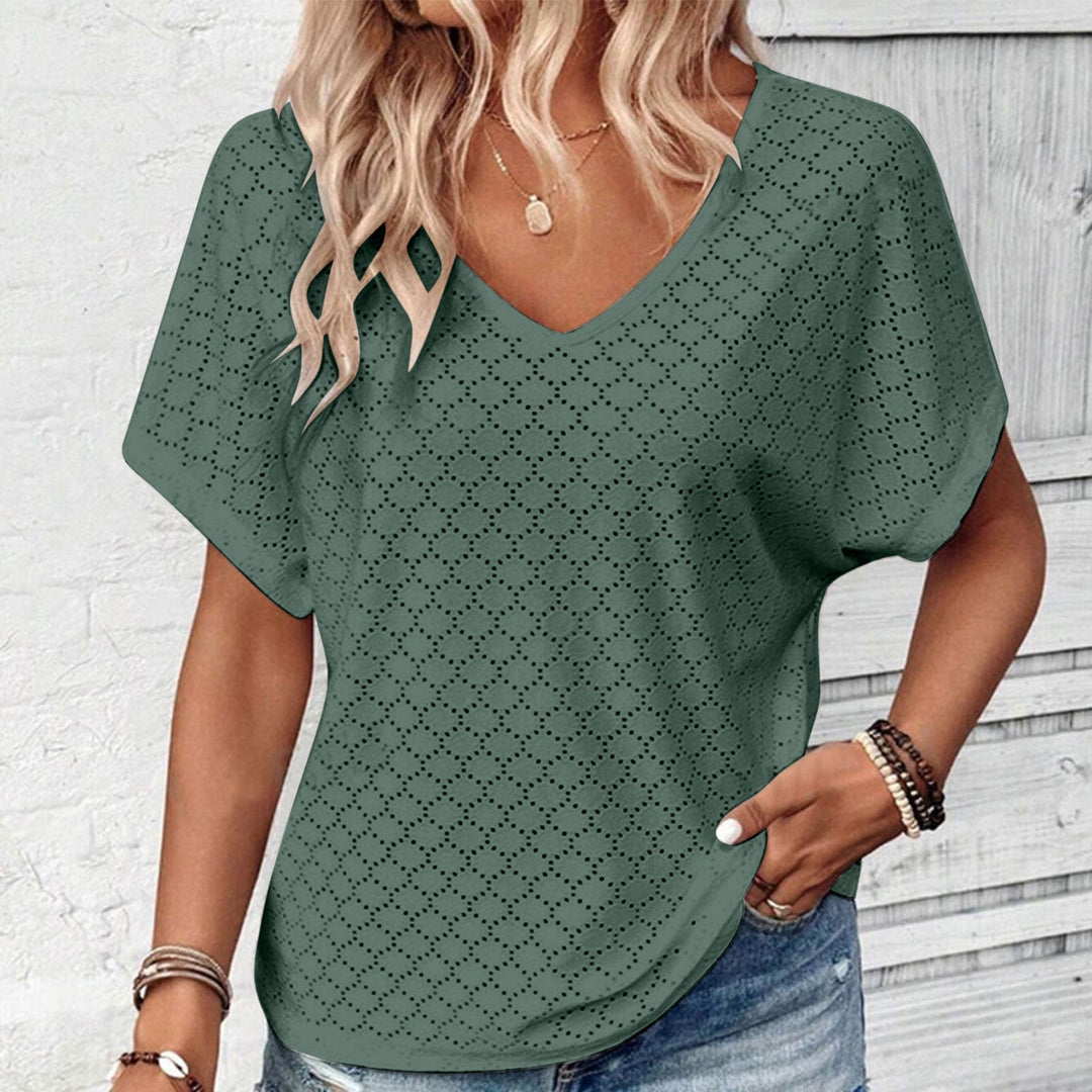 T-shirt with eyelet button embellishment and V-neckline