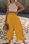 Wide-leg trousers in cotton and linen with elasticated waistband and pockets