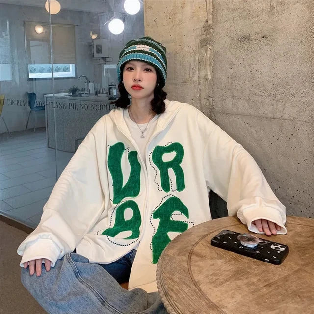 Oversized hoodie with eye-catching letter applications