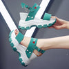 Platform sandals with fishes and high wedge heel