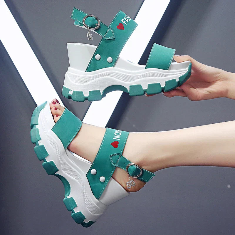 Platform sandals with fishes and high wedge heel