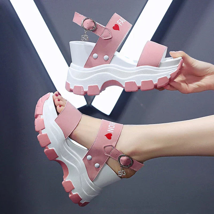 Platform sandals with fishes and high wedge heel