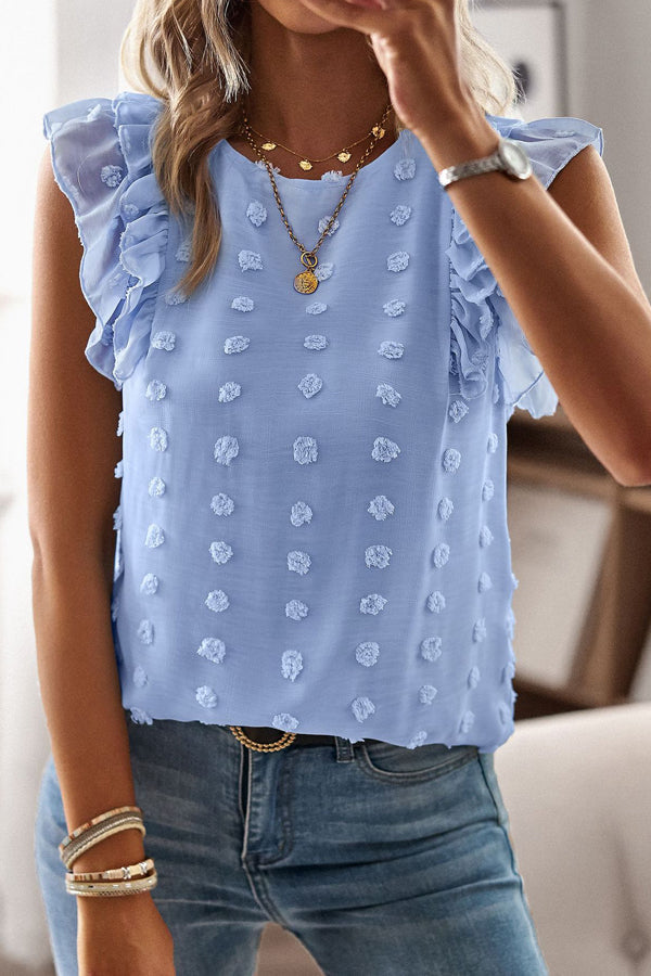 Tops with ruffles on the shoulder and round neckline