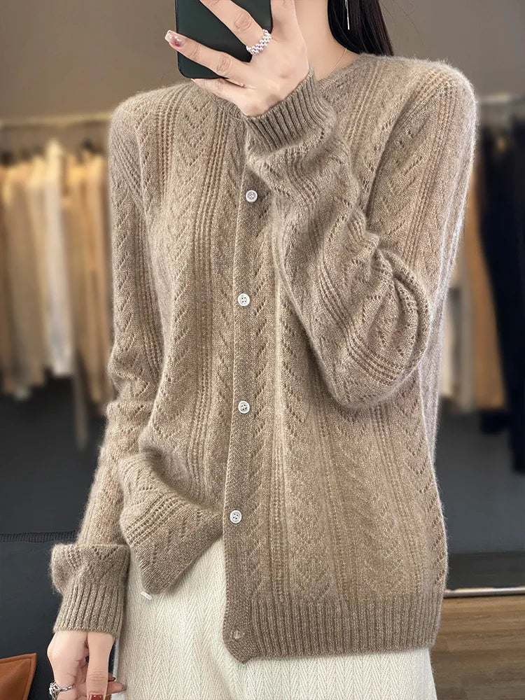 Soft knitted cardigan with cable knit pattern