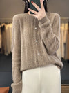 Soft knitted cardigan with cable knit pattern