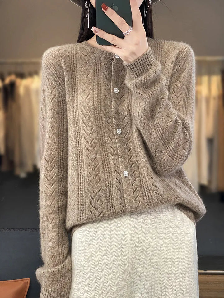 Soft knitted cardigan with cable knit pattern