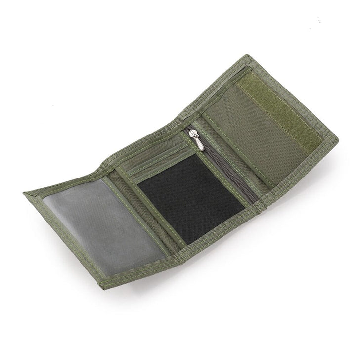 Compact tactical wallet with zip pocket