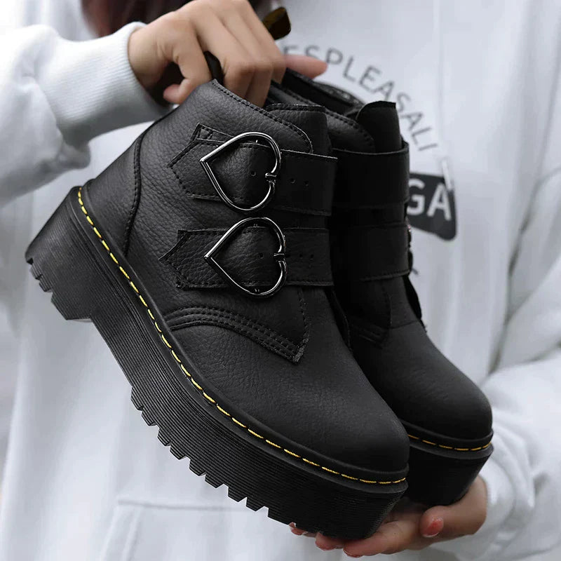 Fashionable ankle boots with heart-shaped buckles