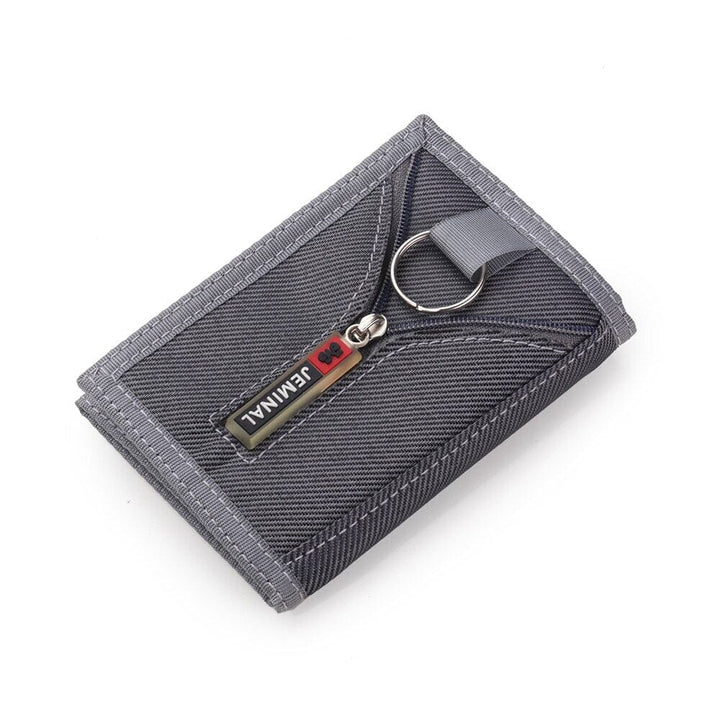 Compact tactical wallet with zip pocket