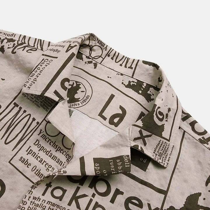 Newspaper print shirt with button placket