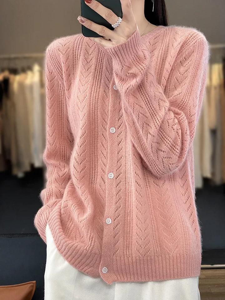 Soft knitted cardigan with cable knit pattern