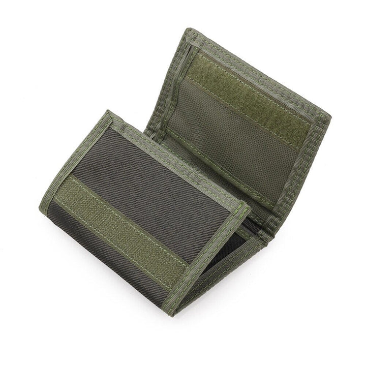 Compact tactical wallet with zip pocket