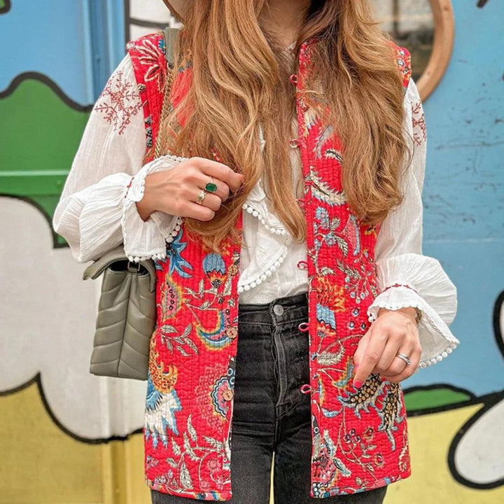 Cheerful sleeveless cardigan with floral pattern