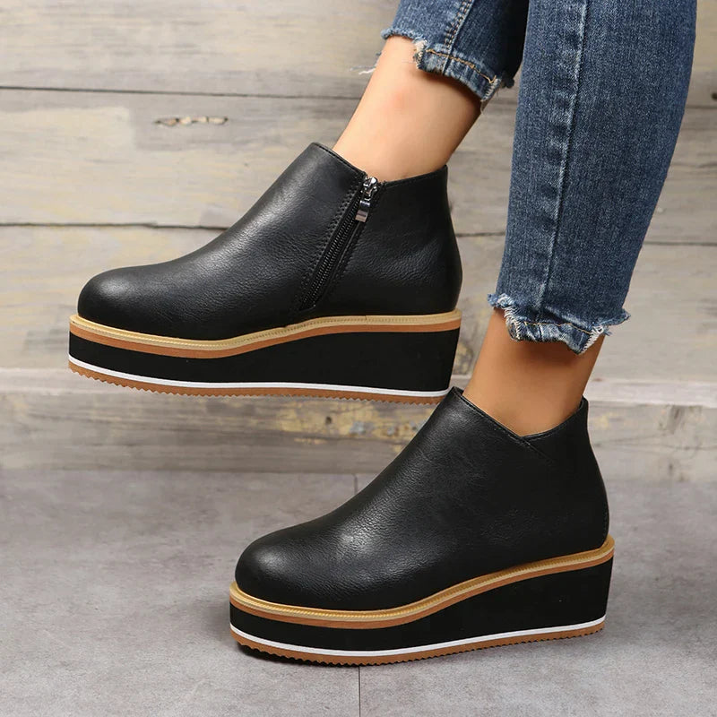 Stylish ankle boots with zip and platform