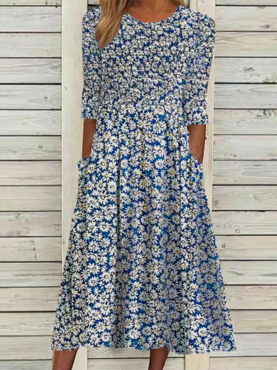 High-quality dress with enchanting floral pattern and handy pockets