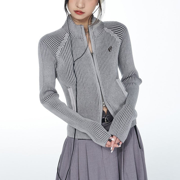 Women's ribbed knit cardigan with grunge accents and zip fastener