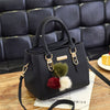 Leather handbag with 3 soft plush balls