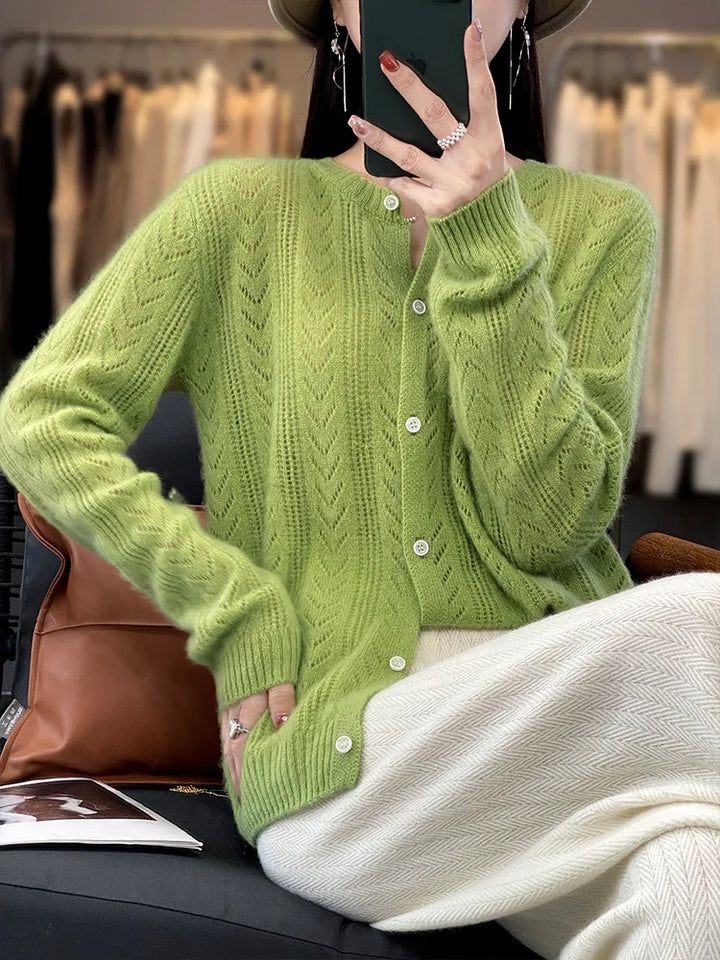 Soft knitted cardigan with cable knit pattern