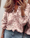 Long-sleeved blouse with ruffles