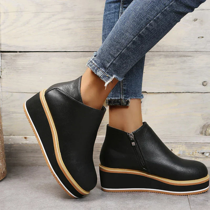 Stylish ankle boots with zip and platform