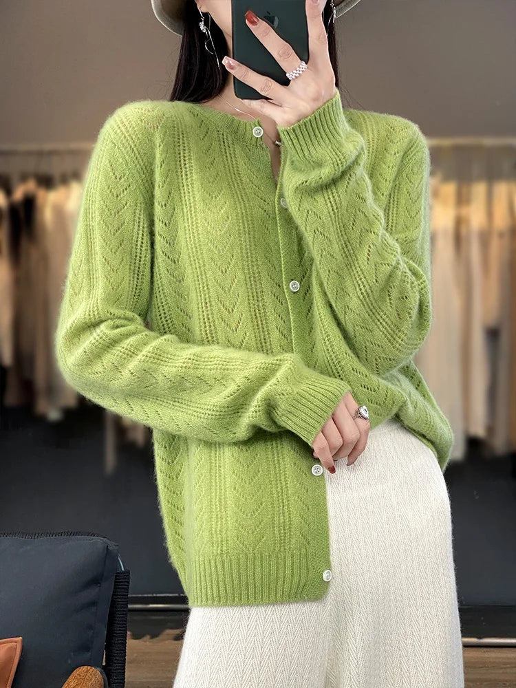 Soft knitted cardigan with cable knit pattern