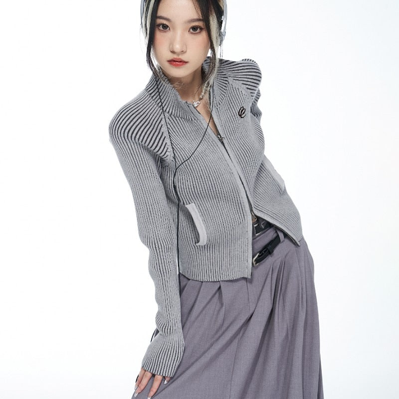 Women's ribbed knit cardigan with grunge accents and zip fastener