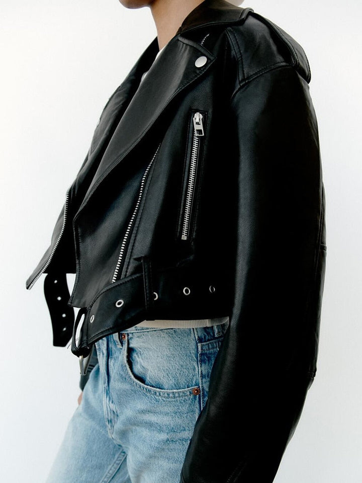 Biker style in vegan leather with belt and zip