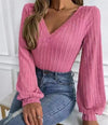 Women's fashionable knitted tops with long sleeves and V-neckline