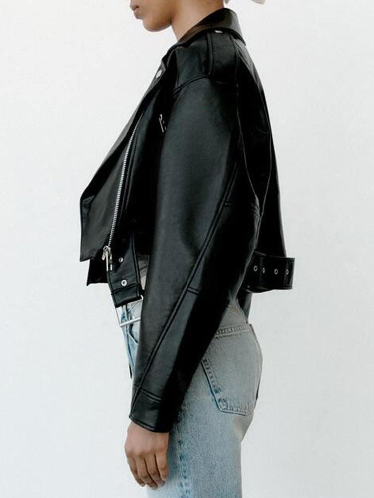 Biker style in vegan leather with belt and zip