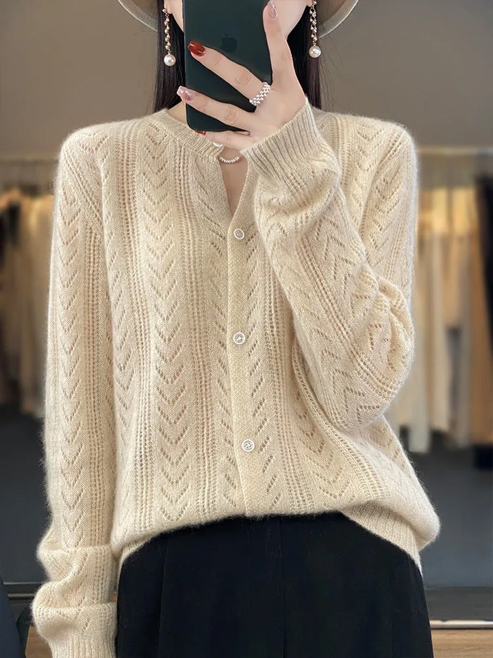 Soft knitted cardigan with cable knit pattern