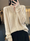 Soft knitted cardigan with cable knit pattern