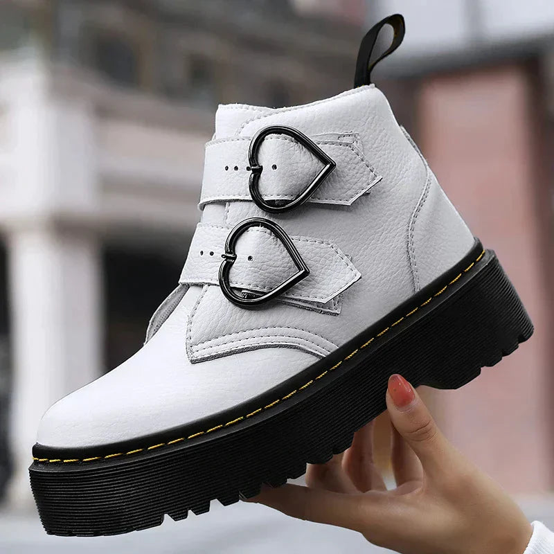 Fashionable ankle boots with heart-shaped buckles