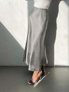 The elegant satin midi skirt