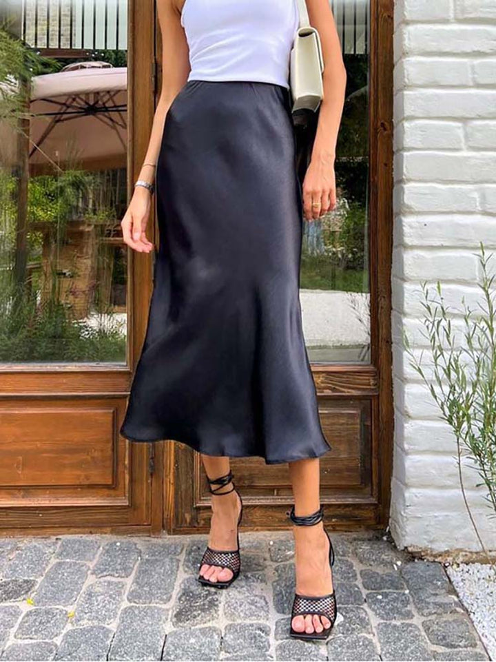 The elegant satin midi skirt