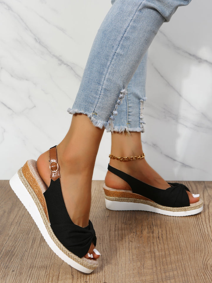 Wedge sandals with peep toe buckle