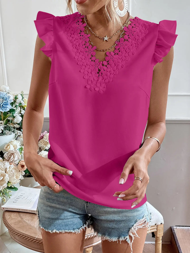 Blouse with lace embroidery and frills