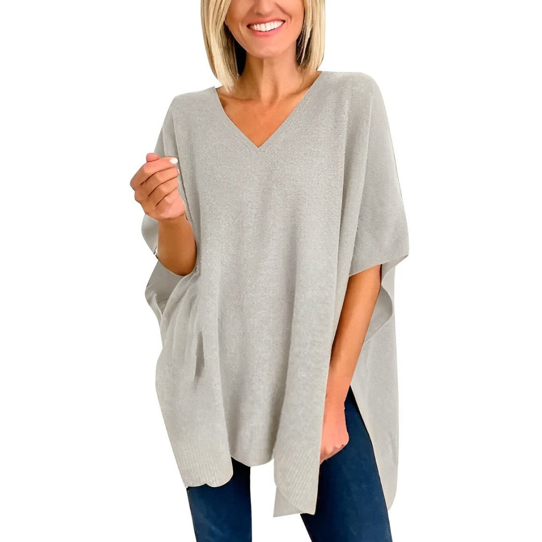 Sweater with irregular hem and V-neckline