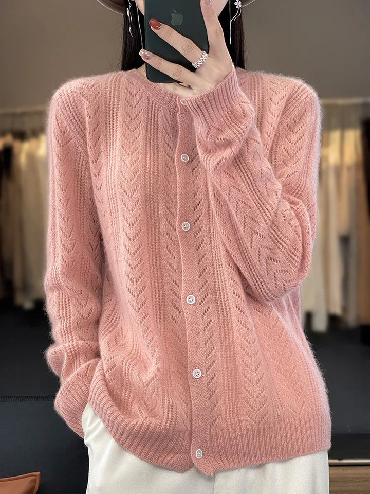 Soft knitted cardigan with cable knit pattern