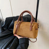 Ladies shoulder bag in faux suede