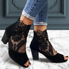 Luxurious black ankle high heel with lace details