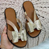 Summery women's sandals with bow and flat heel