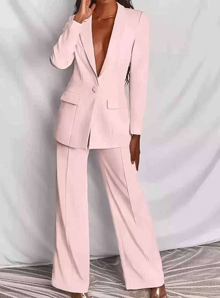 Stylish trendy ladies' suit with blazer and long trousers