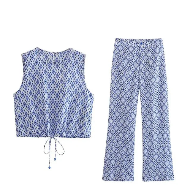 Bow-embellished top and high-waist trousers