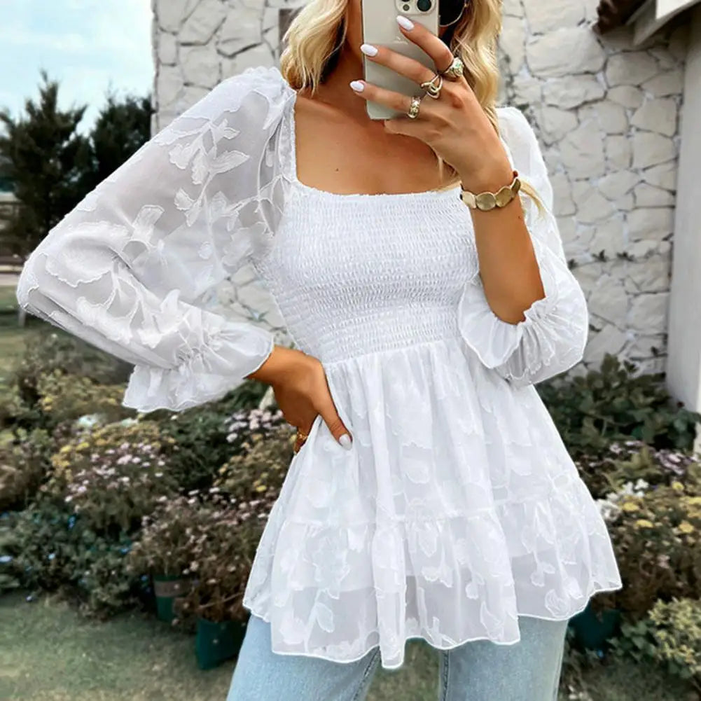 Ruffled blouse with a square neckline and sheer sleeves